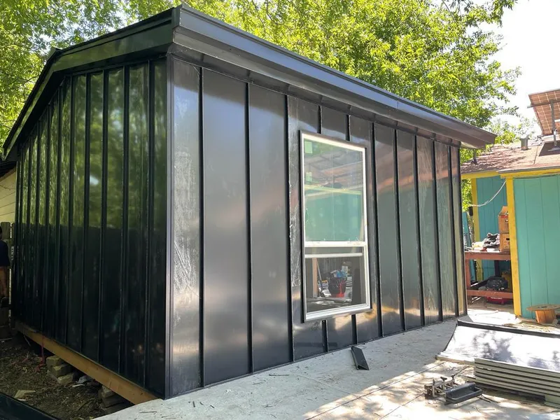 Black standing seam metal wall panels for Roof Inspection in Nutley